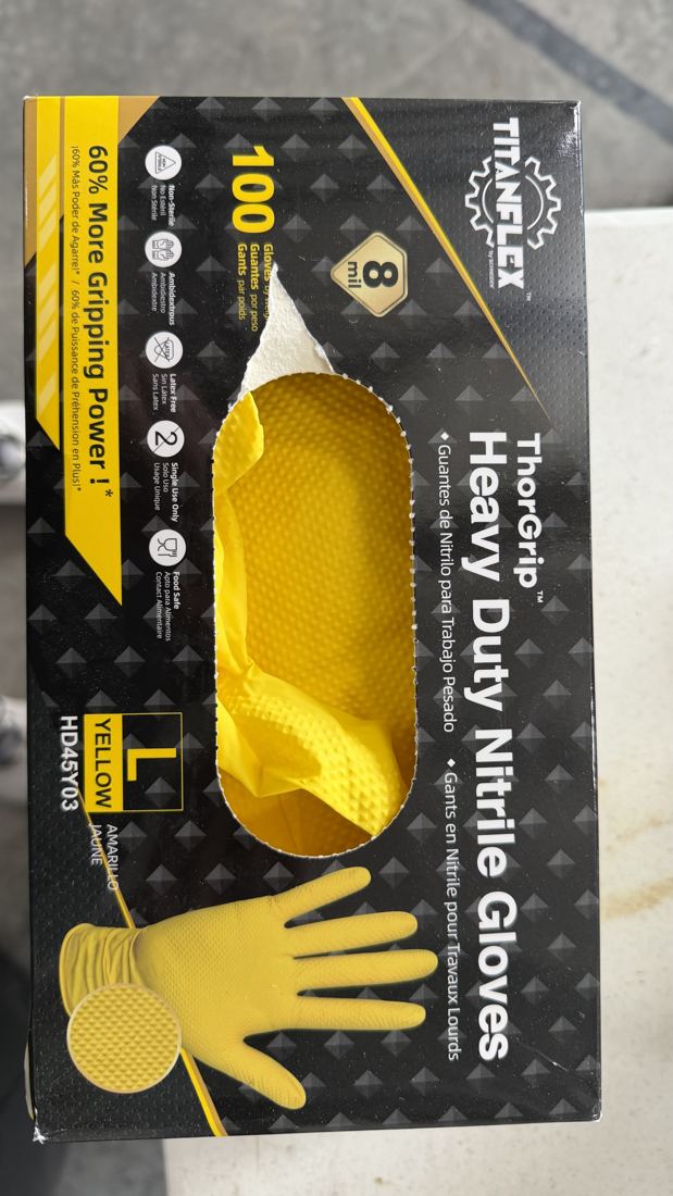 TITANflex 8 Mil Nitrile Gloves in use at our shop